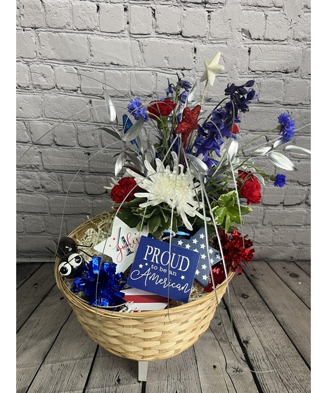 patriotic bouquet with gifts in wicker basket